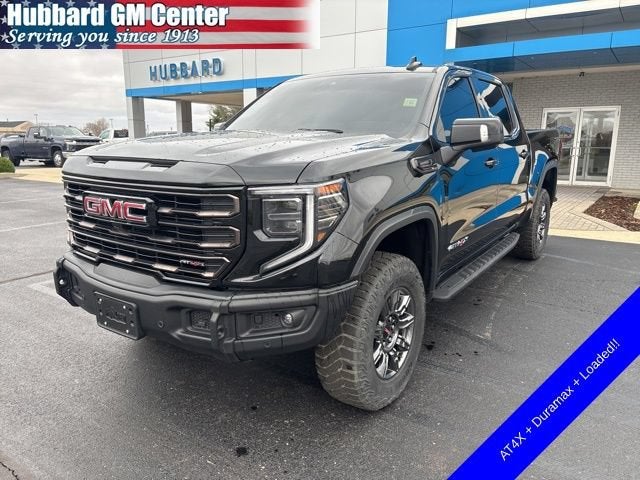 2024 GMC Sierra 1500 AT4X in Onyx Black — front three-quarter view