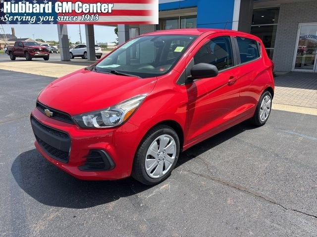 2017 Chevrolet Spark LS in Red Hot — front three-quarter view